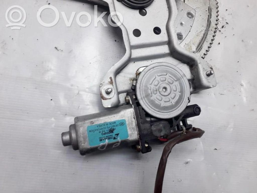 KIA Carens I Motorino alzacristalli della portiera anteriore 