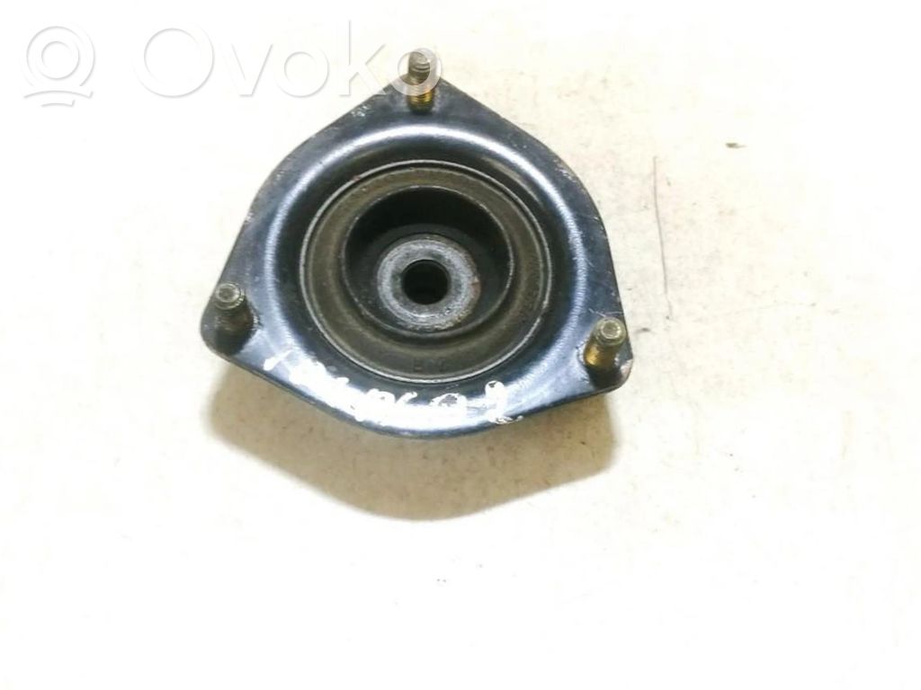 Nissan Almera N16 Supporto di montaggio della molla elicoidale