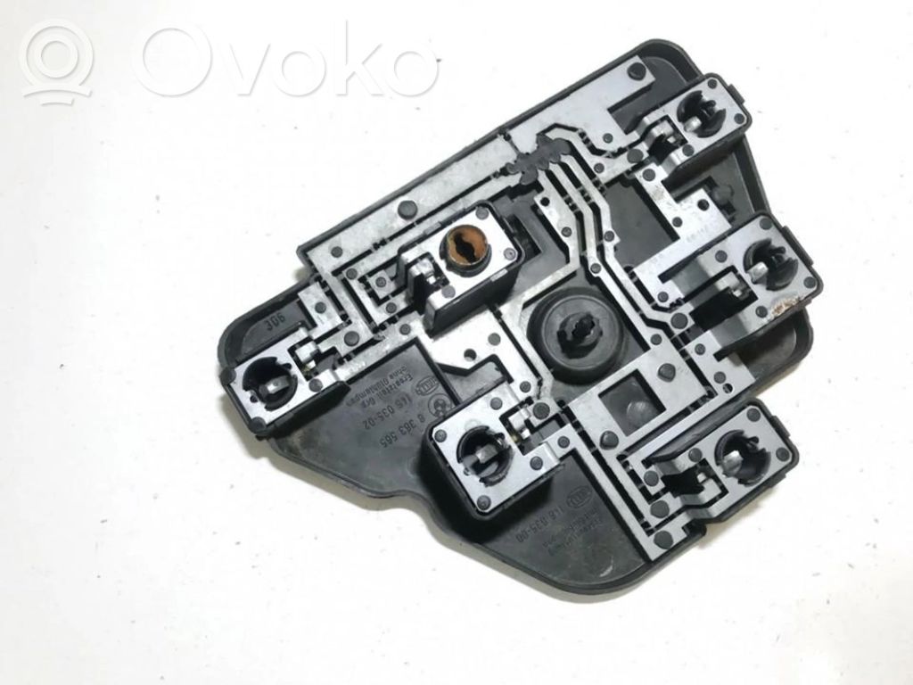 BMW 5 E39 Takavalon polttimon suojan pidike 