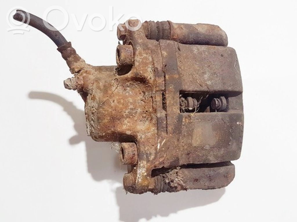 Dacia Logan I Zacisk hamulcowy przedni 