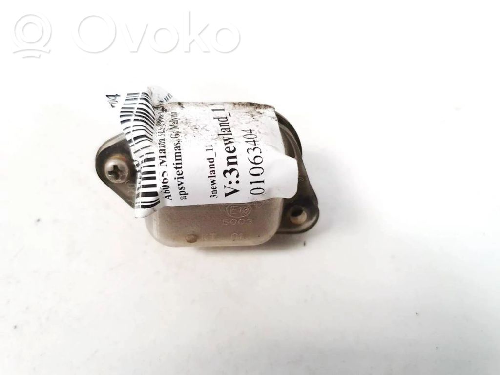 Mazda 323 Numura zīmes apgaismojums 