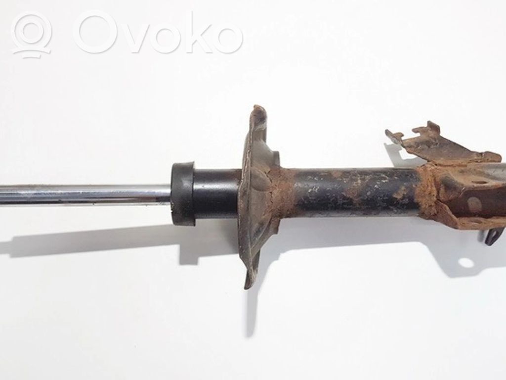 Nissan Almera N16 Priekinis amortizatorius