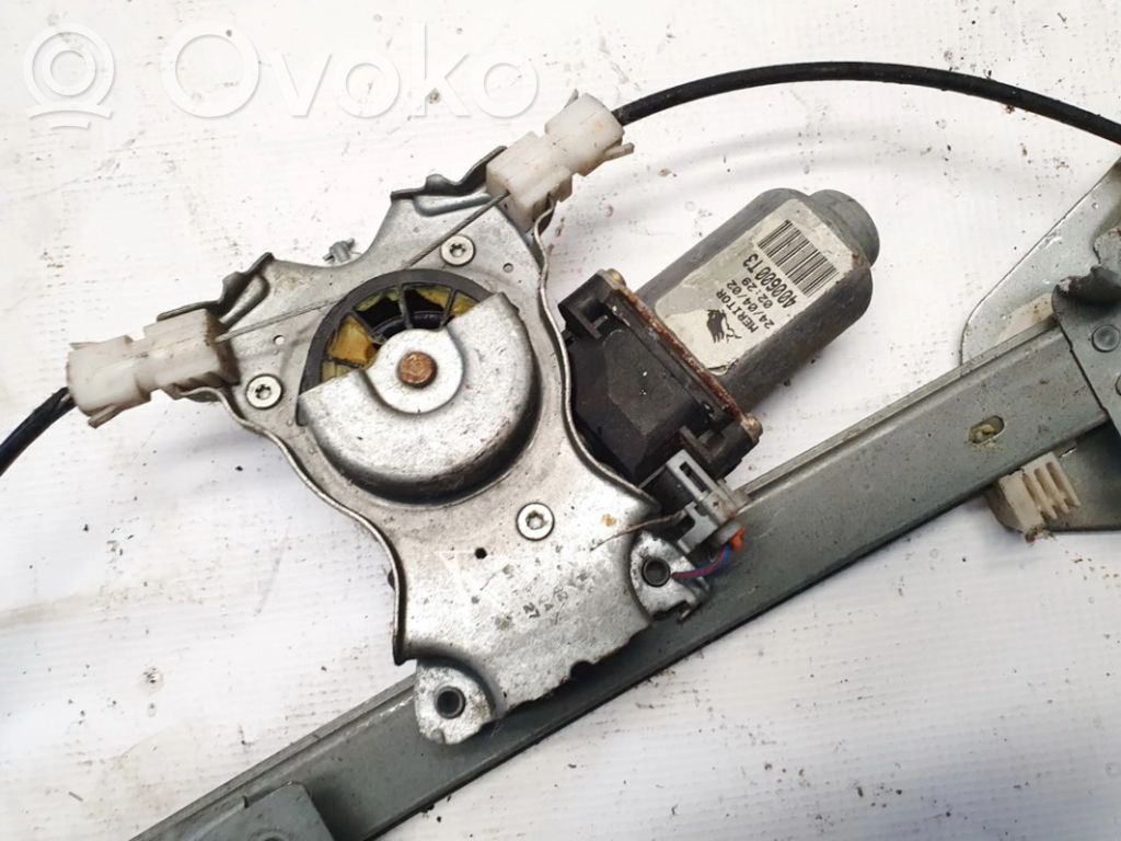 Nissan Almera N16 Motorino alzacristalli della portiera anteriore 