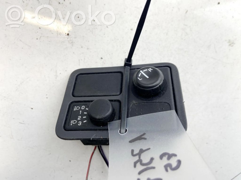 Nissan Almera N16 Interruttore di regolazione livello altezza dei fari 