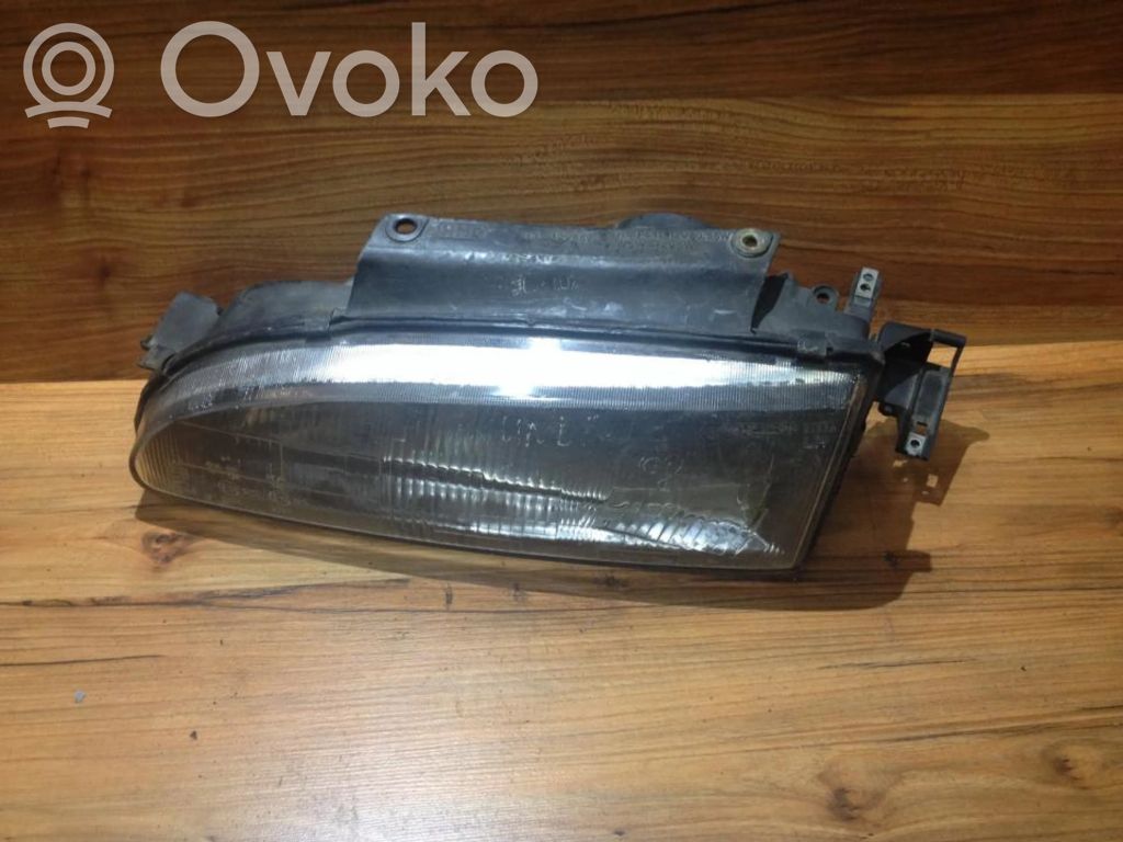 Hyundai Scoupe Headlight/headlamp 