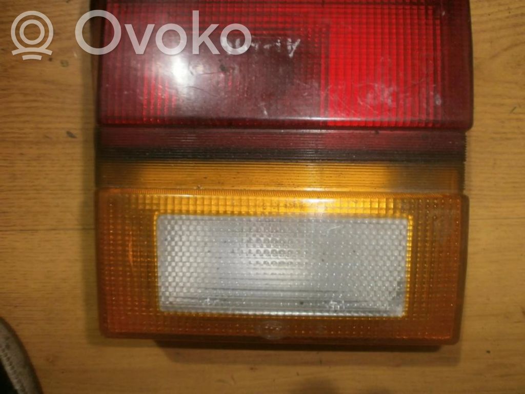 Audi 100 200 5000 C3 Lampă spate în capacul portbagajului 