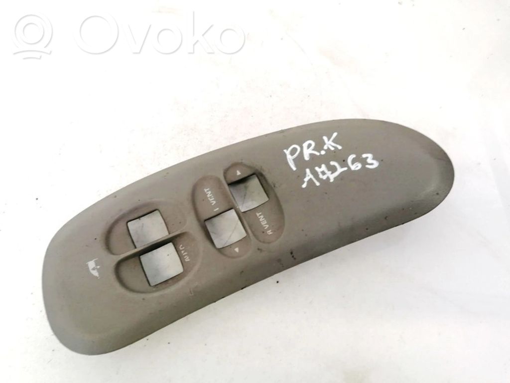 Dodge Caravan Front door window switch trim 