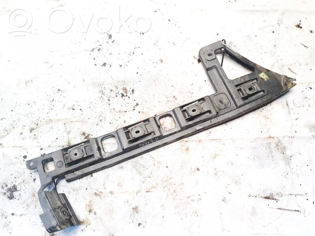 Volkswagen PASSAT B6 Uchwyt / Mocowanie zderzaka tylnego 