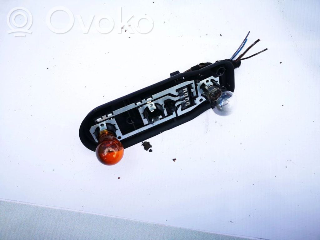 Takavalon polttimon suojan pidike   2496339,2496339