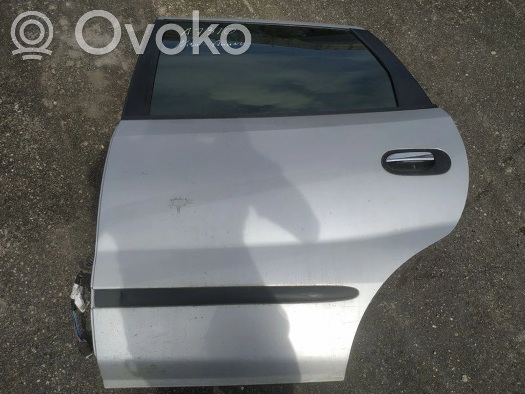 Nissan Almera Tino Задняя дверь 