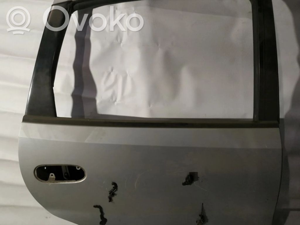 Nissan Almera Tino Galinės durys