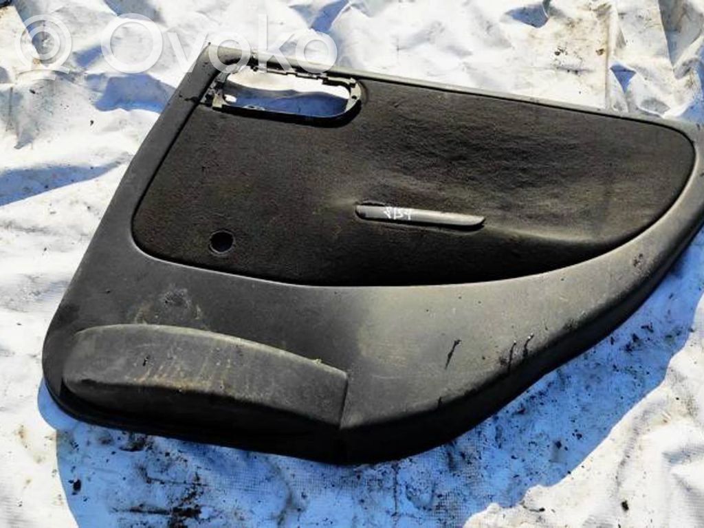 Opel Corsa C Takaoven verhoilu 