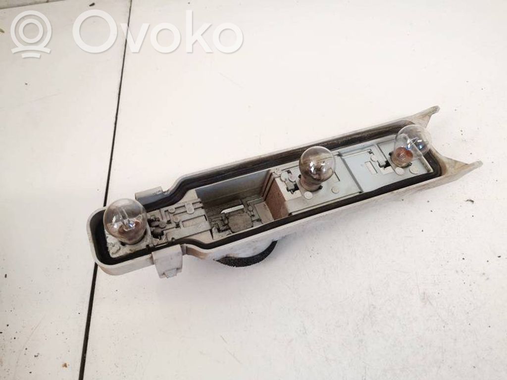 Ford Focus Takavalon polttimon suojan pidike 
