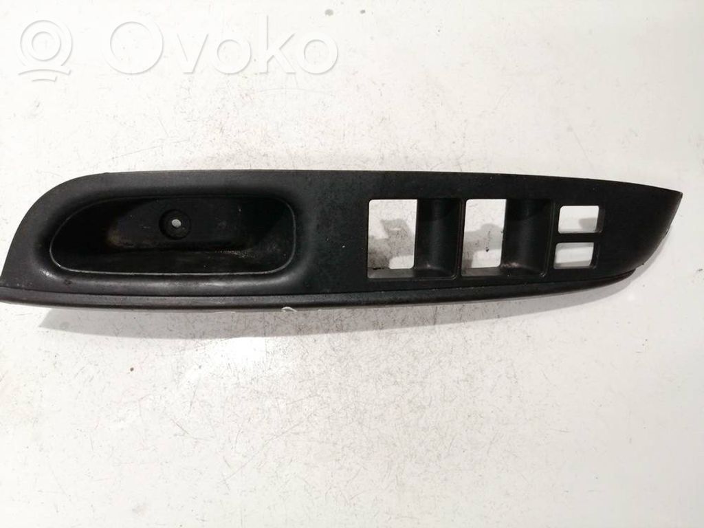 Nissan Note (E12) Front door window switch trim 