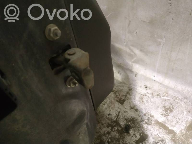 Front door check strap stopper