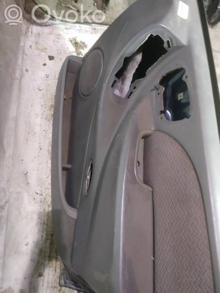Front door card panel trim