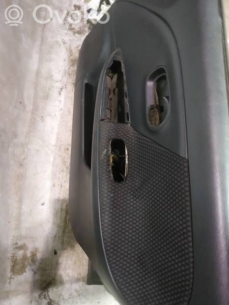 Nissan Note (E11) Panou tapițerie ușă față 