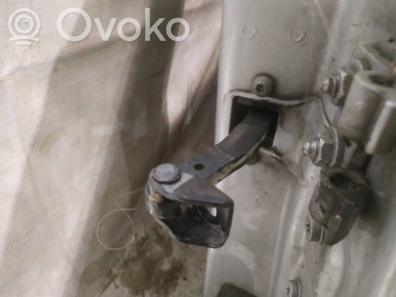 Tope freno de puerta delantera