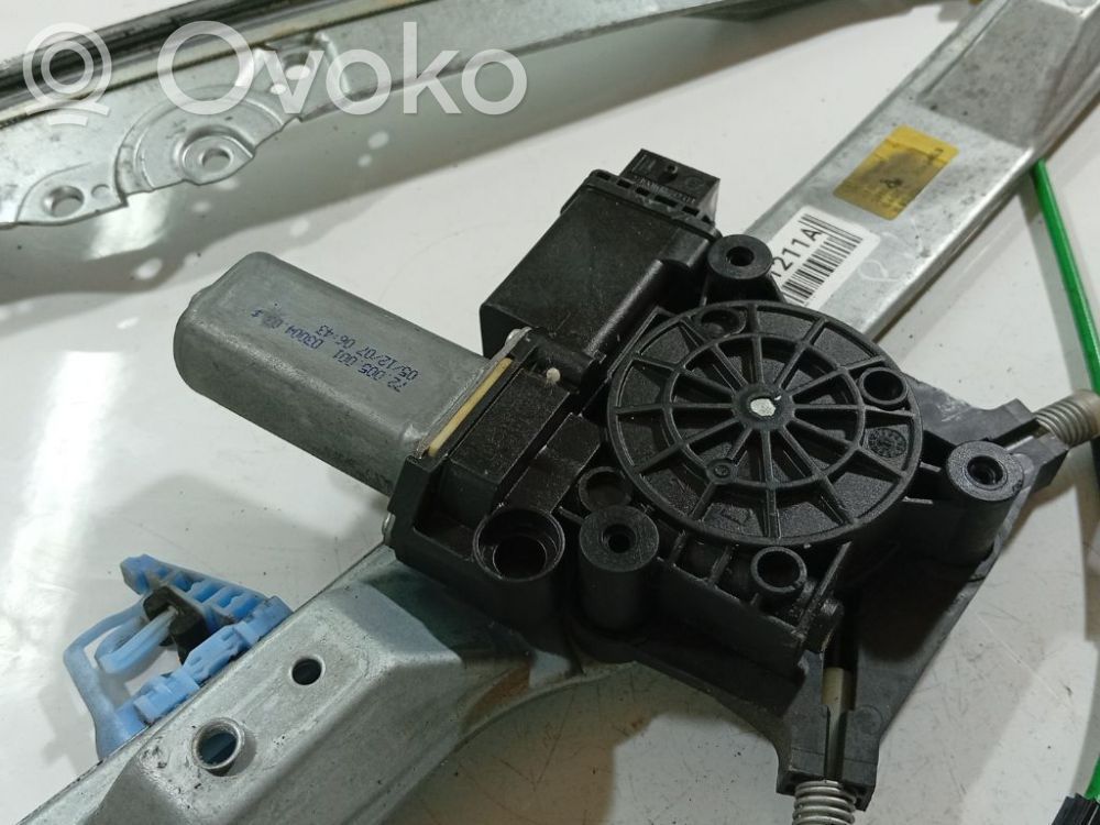 Opel Corsa D Moteur de lève-vitre de porte avant 