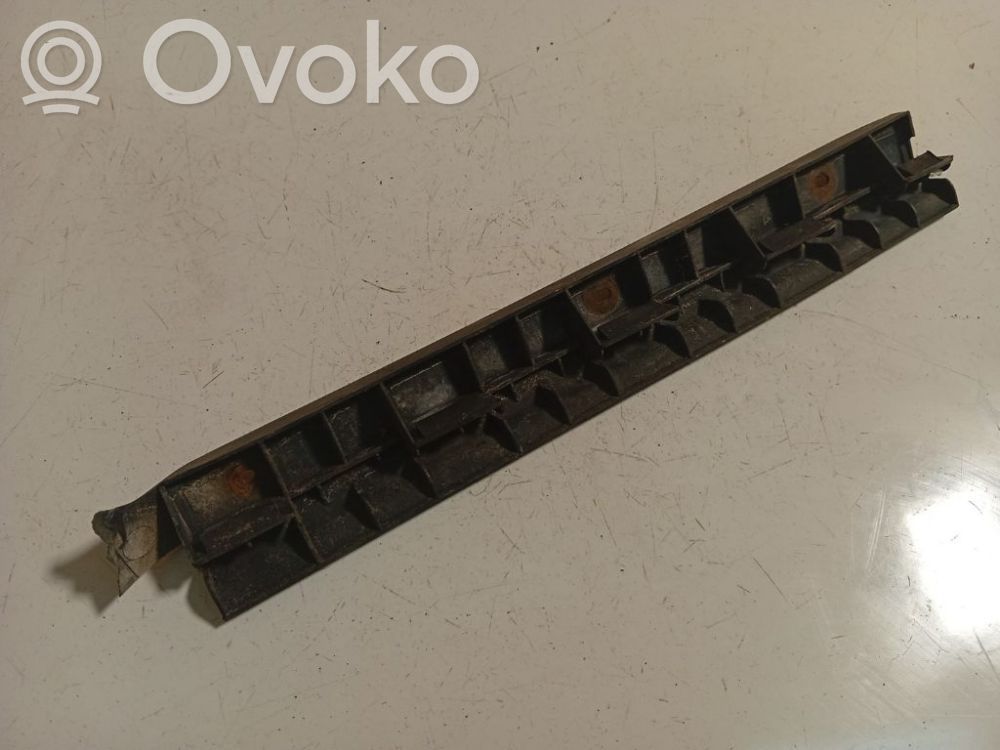 Volkswagen PASSAT B5 Uchwyt / Mocowanie zderzaka tylnego 