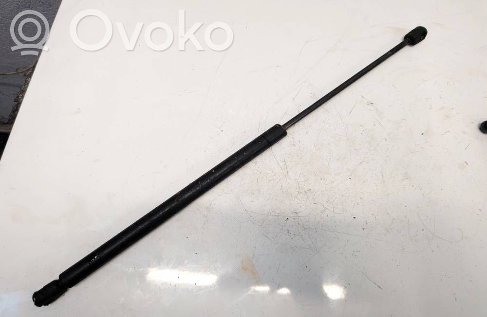 Nissan Almera N16 Vérin de capot arrière