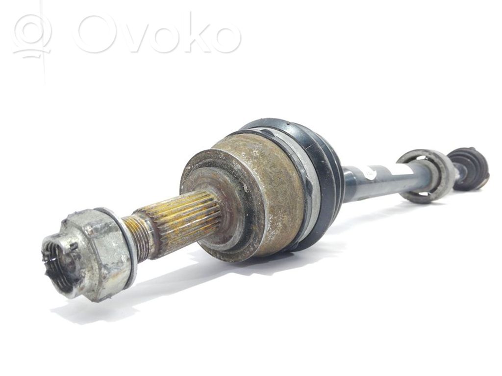 Opel Corsa D Eje de transmisión delantero 