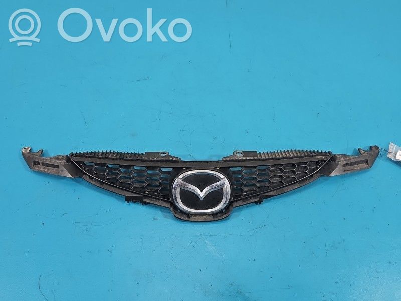 Mazda 2 Front bumper upper radiator grill 
