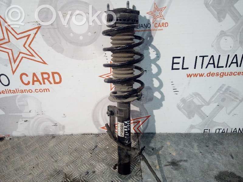 Front shock absorber with coil spring   3664