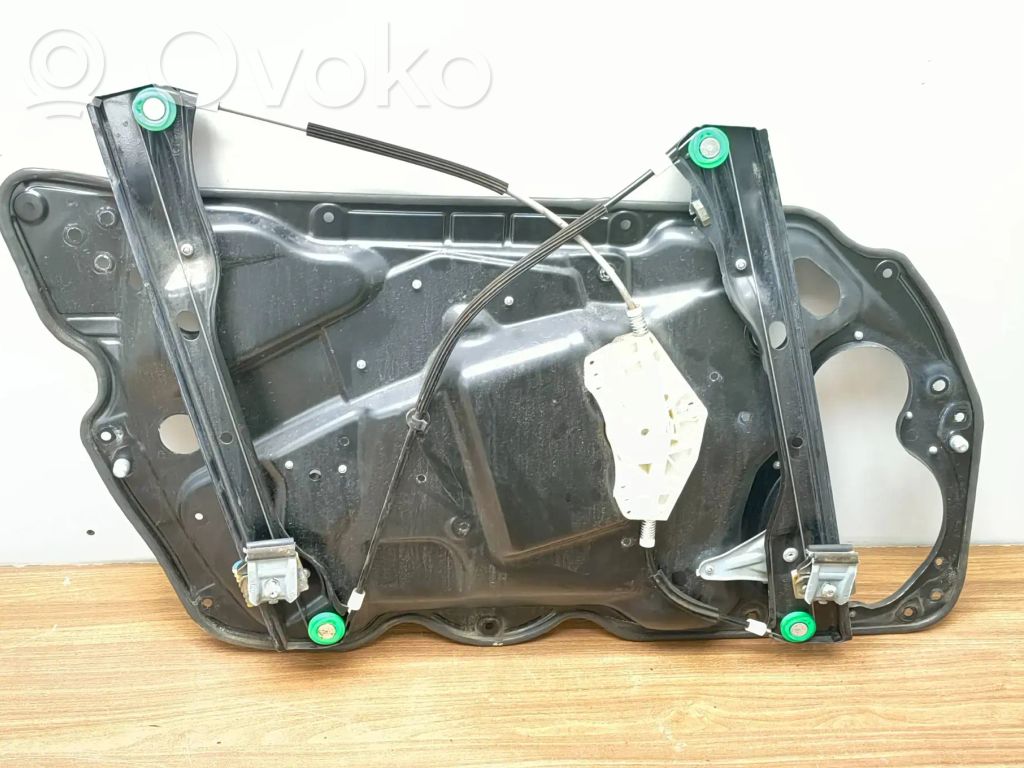 Volkswagen PASSAT B6 Elektryczny podnośnik szyby drzwi przednich 