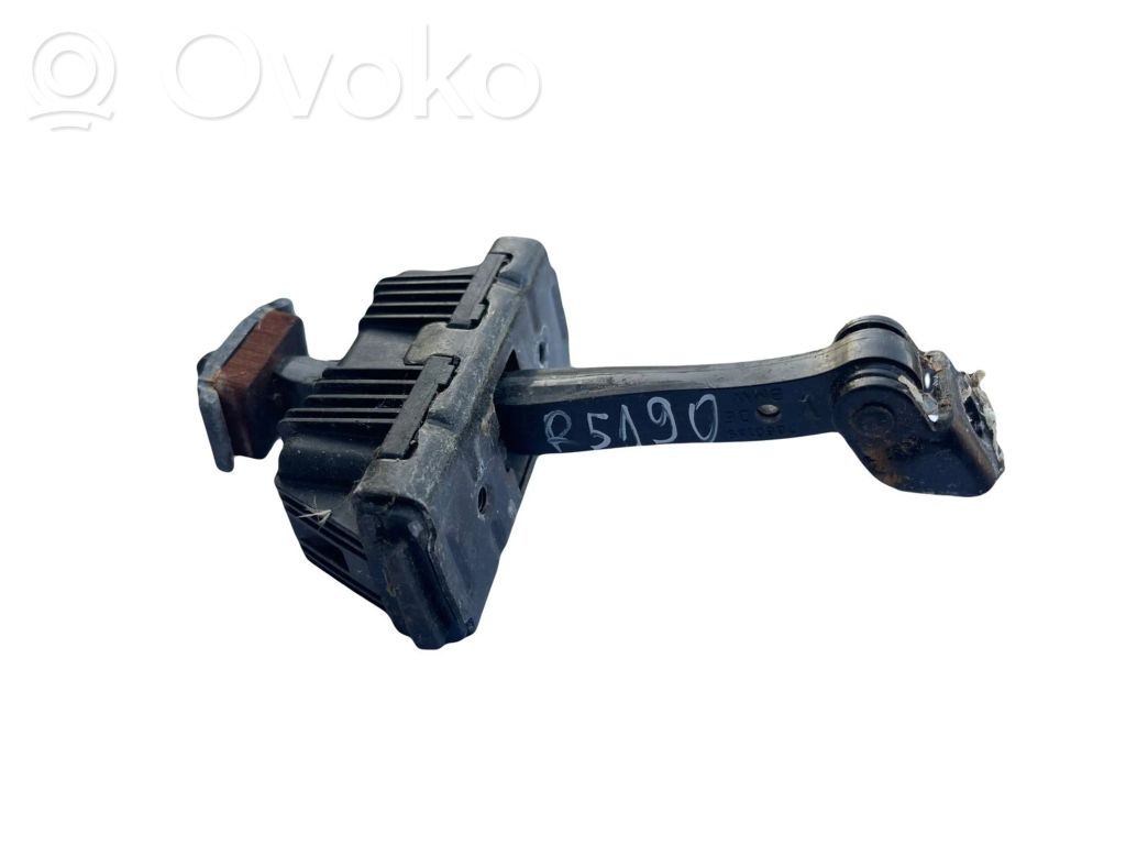Front door check strap stopper   7060189