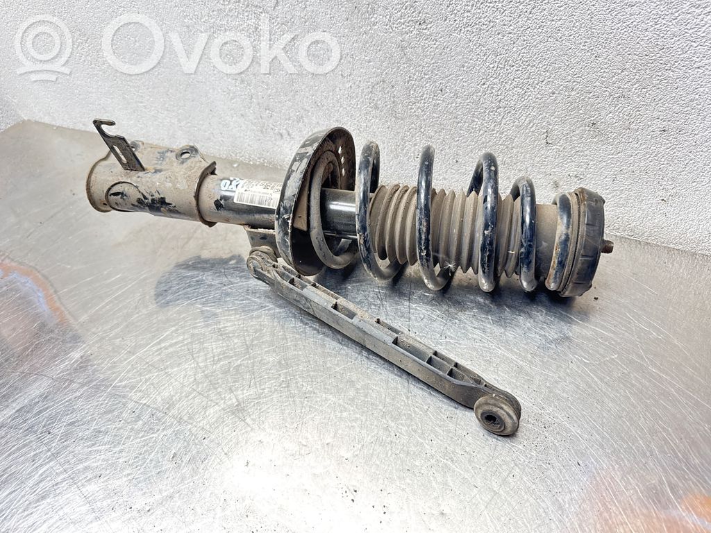 Opel Astra J Front shock absorber with coil spring 