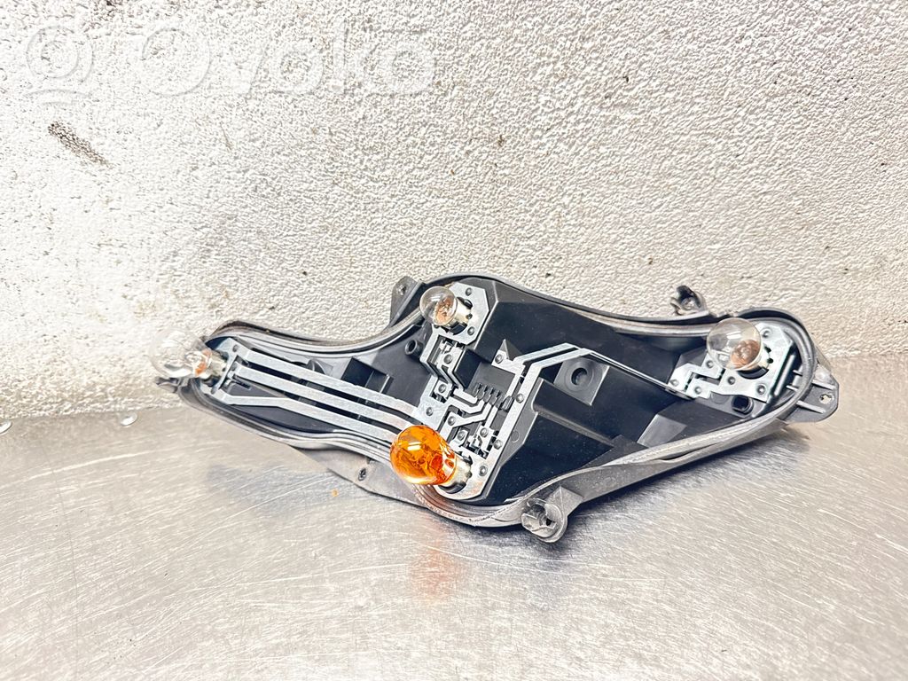 Opel Insignia A Takavalon polttimon suojan pidike 