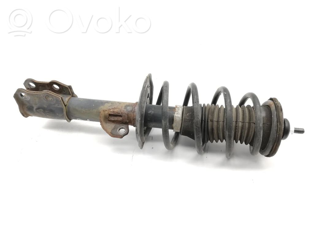 Toyota Verso-S Amortyzator przedni 
