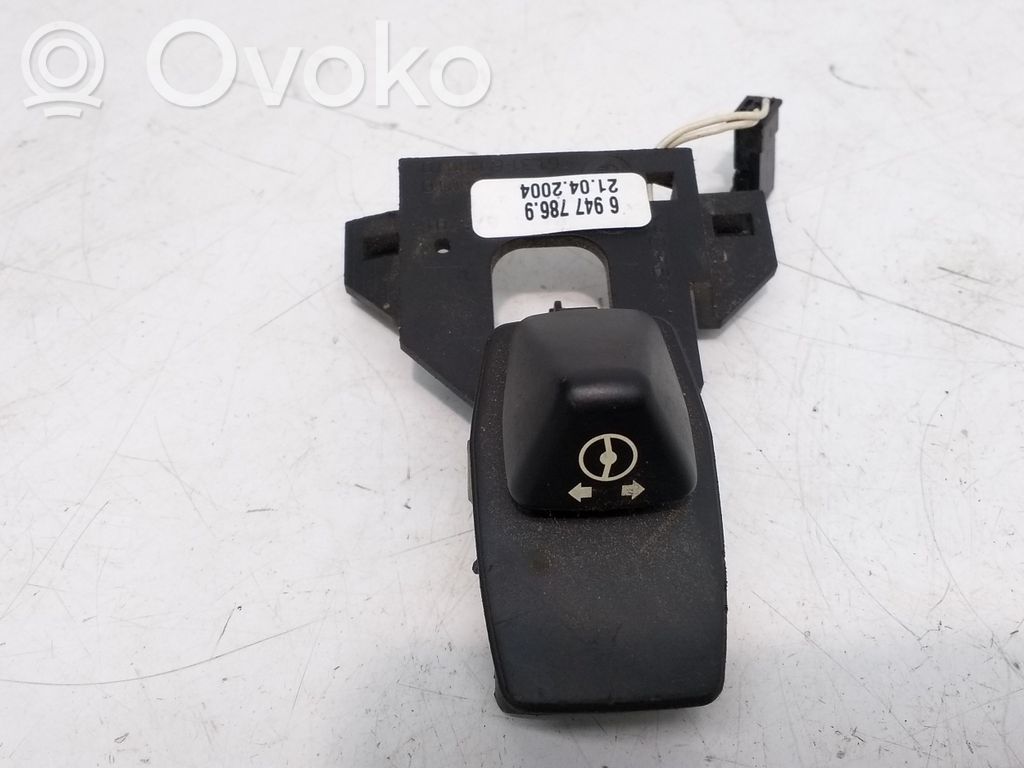 Steering wheel adjustment switch   6947786