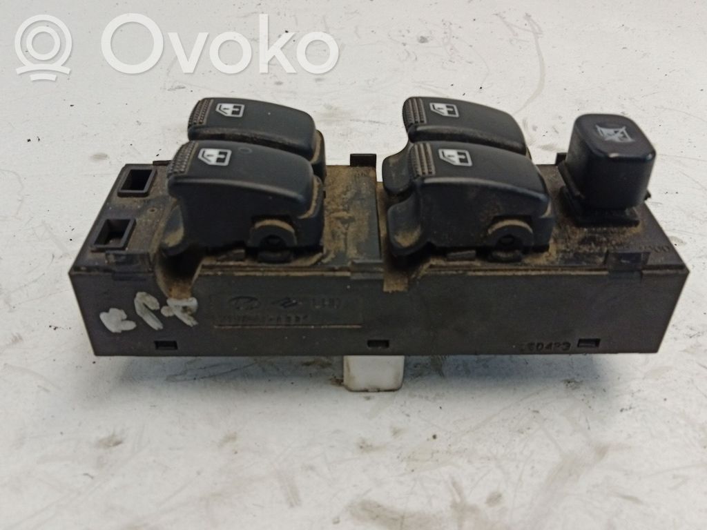 KIA Carens I Electric window control switch 