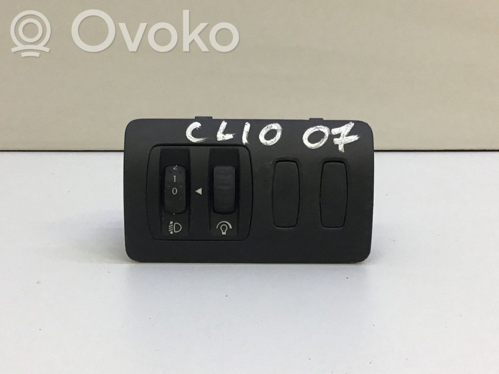 Renault Clio III Ajovalojen korkeuden säätökytkin 