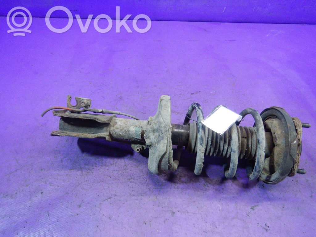 Front shock absorber with coil spring