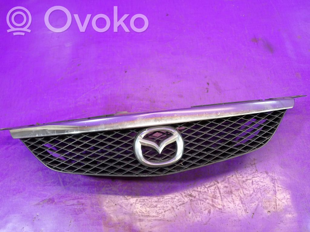 Mazda 323 Augšējais režģis 