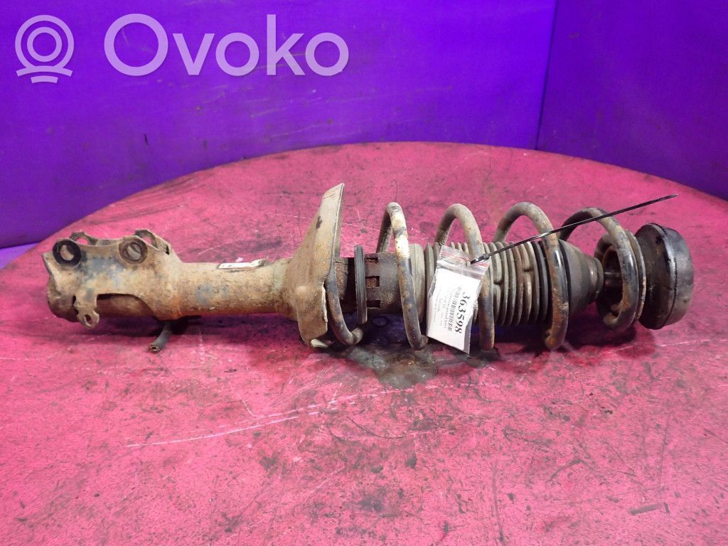 Volkswagen Golf III Amortyzator osi przedniej ze sprężyną 