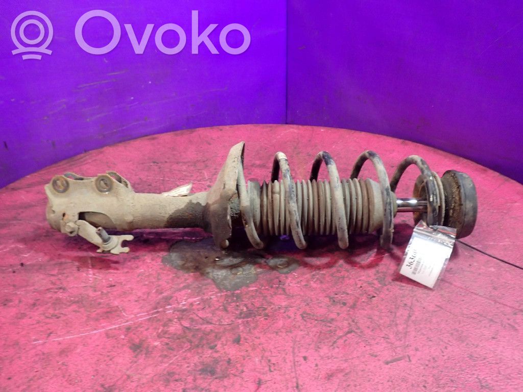 Volkswagen Golf III Amortyzator osi przedniej ze sprężyną 