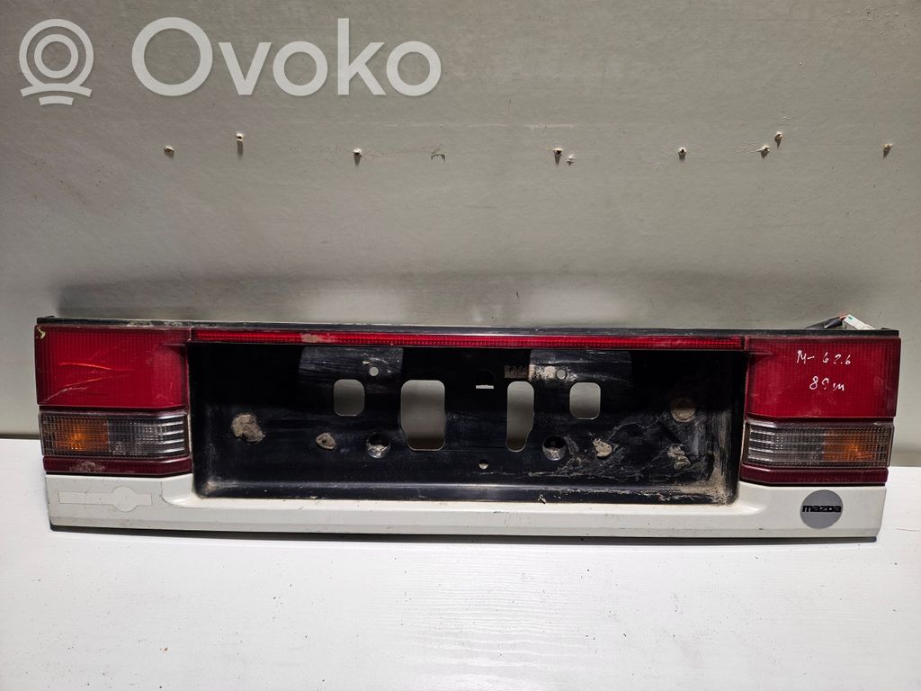 Mazda 626 Rear light center trim bar blend 