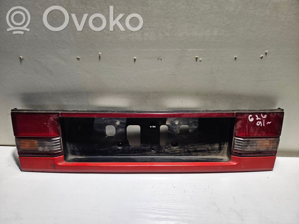 Mazda 626 Rear light center trim bar blend 
