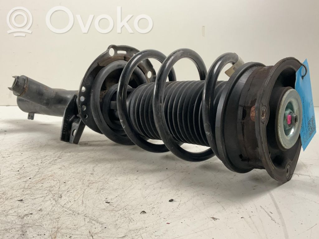 Volkswagen PASSAT B8 Amortyzator osi przedniej ze sprężyną 