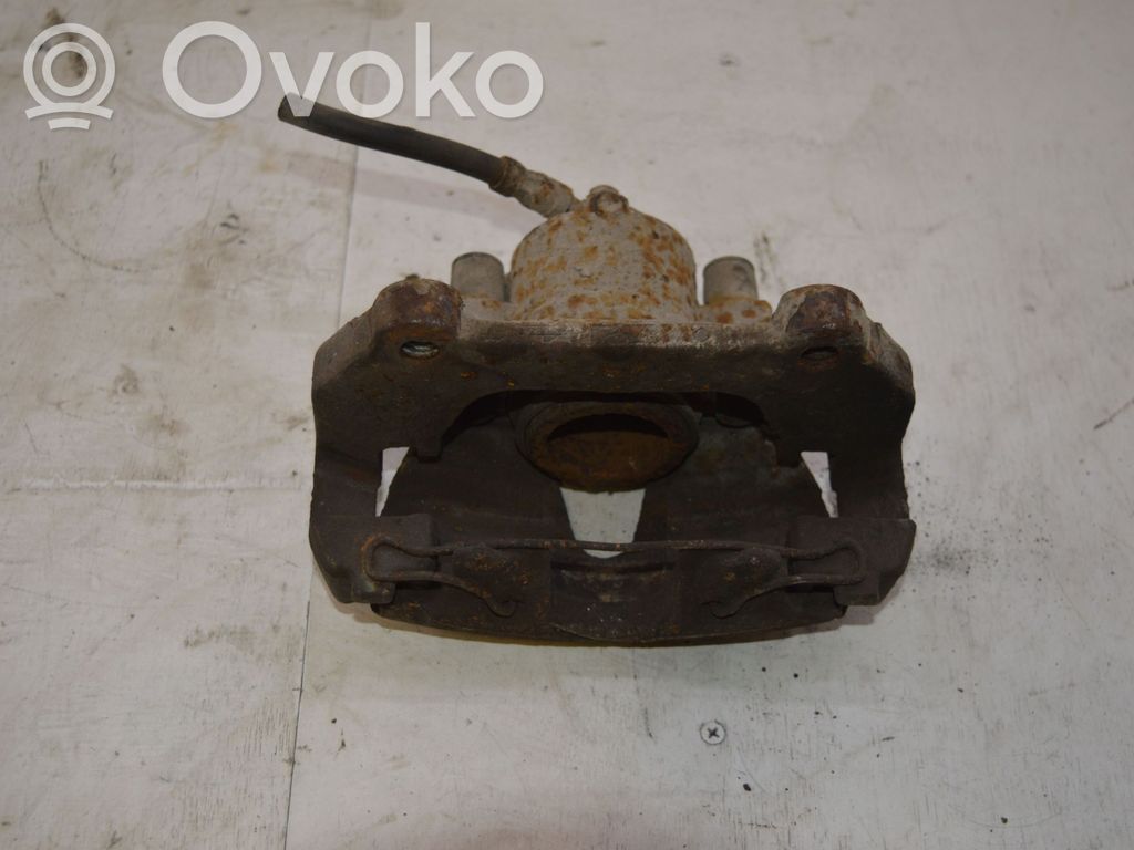 Saab 9-5 Zacisk hamulcowy przedni 