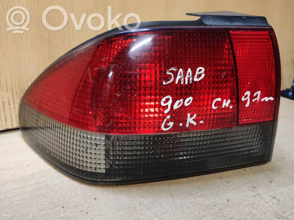 Saab 900 Takavalon polttimon suojan pidike 
