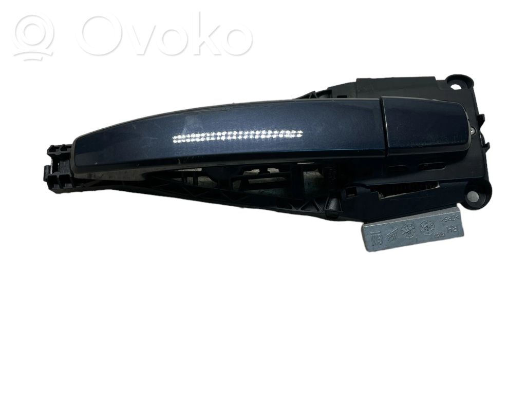 Opel Astra J Front door exterior handle 