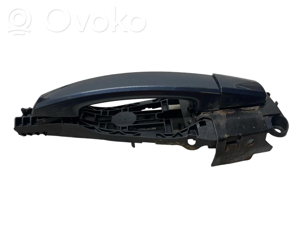 Opel Astra J Front door exterior handle 