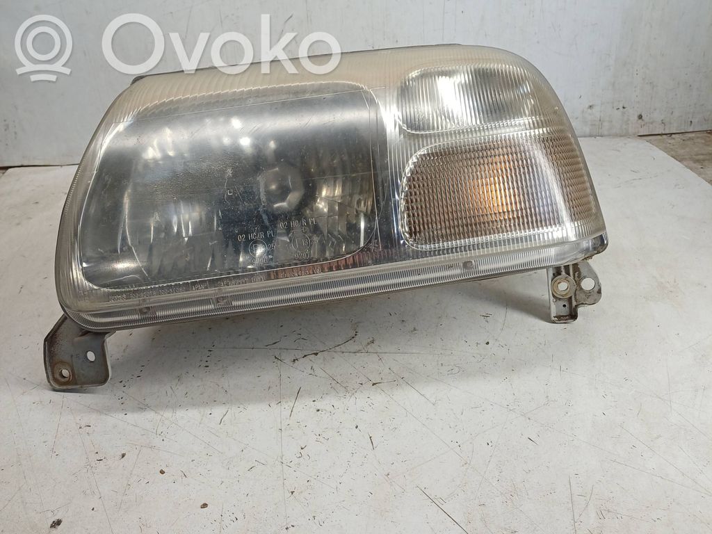 Suzuki Grand Vitara I Lampa przednia 