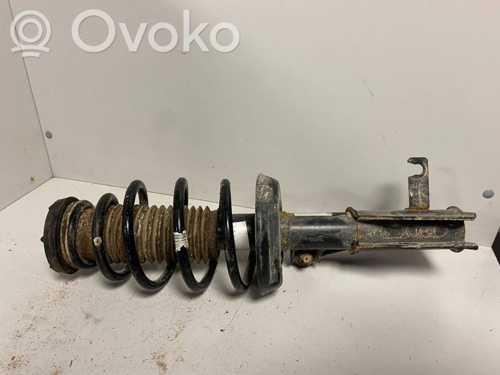 Opel Astra J Etuiskunvaimennin kierrejousella 