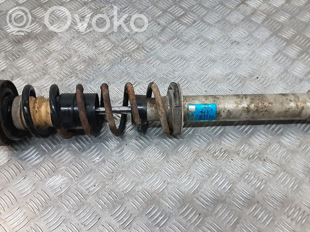 Aizmugurē amortizators   33056A
